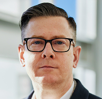 Alexander Hughes, dyrektor generalny CEO kierujący firmą crypto trading, portret